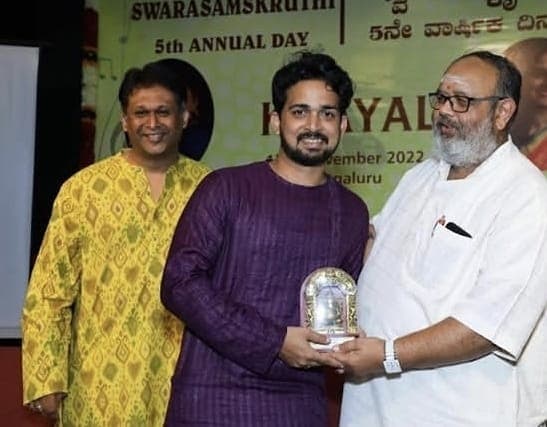 Ayushman playing the flute